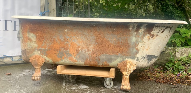 A magnificent large original Shanks cast iron roll top bath, with tall Lions Paw Feet. Retrieved from a Scottish Castle and fitted with an oversized nickel overflow and waste, so will ideally be dressed with nickel tapware.