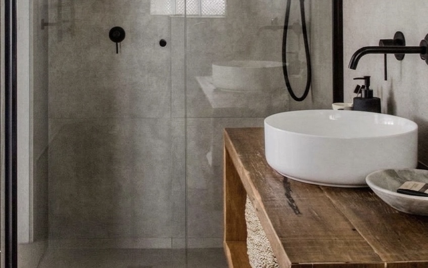 concrete walled bathroom